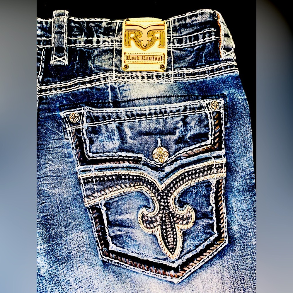 Rock Revival Blue Jeans with Decorative Stitching and Metal Rivets